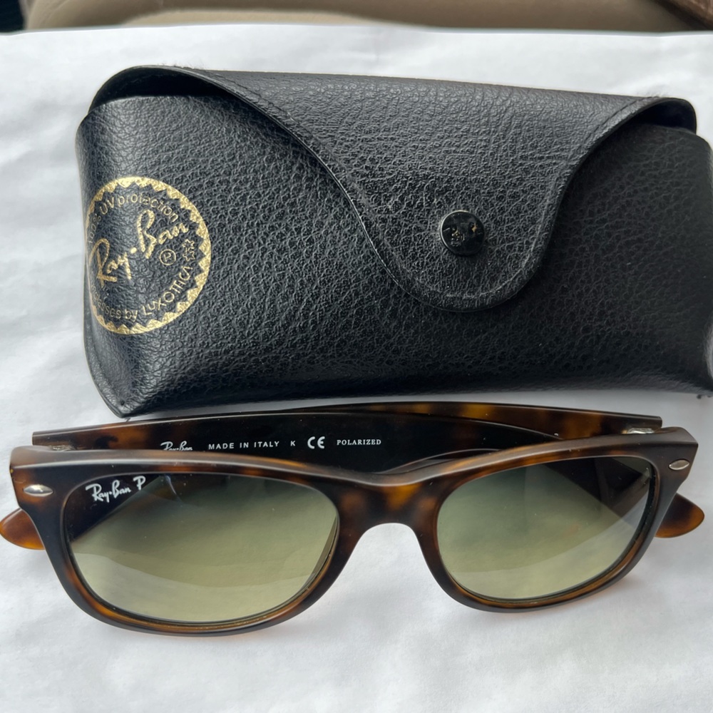 RayBan New Wayfarer glasses with gradient, polarized lenses.